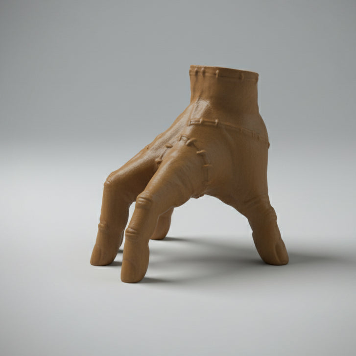 Thing the hand Wednesday Adams