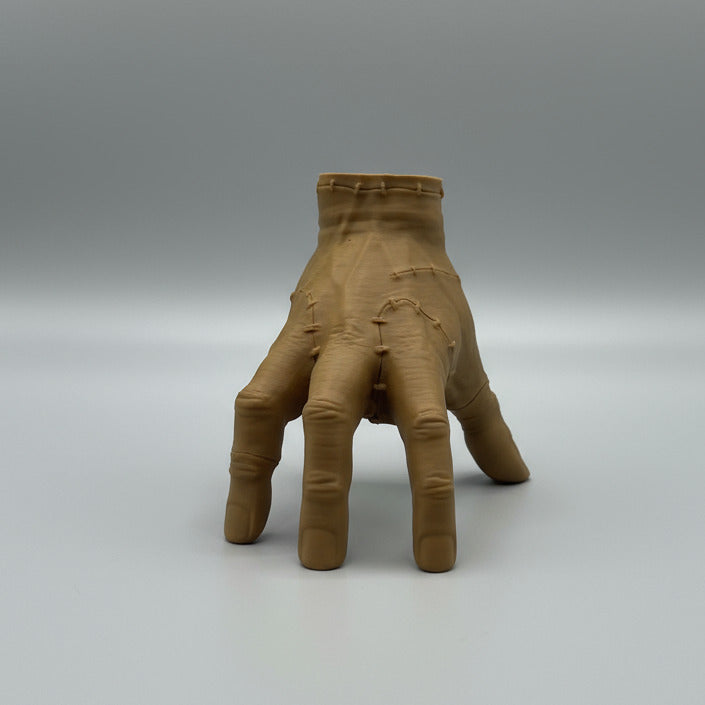 Thing the hand Wednesday Adams