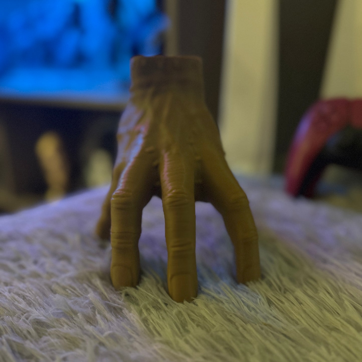 Thing the hand Wednesday Adams